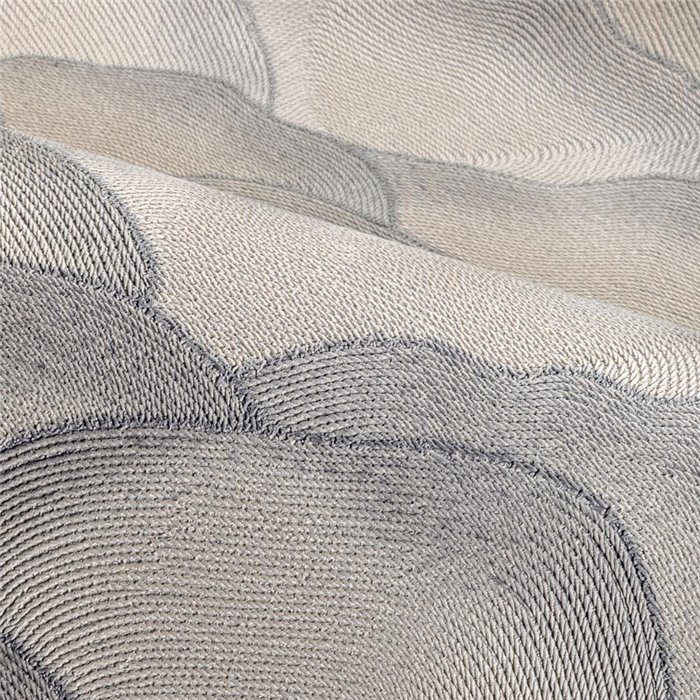 Contemporary wallpaper with soft wave patterns · Casamance Broderies 76971528